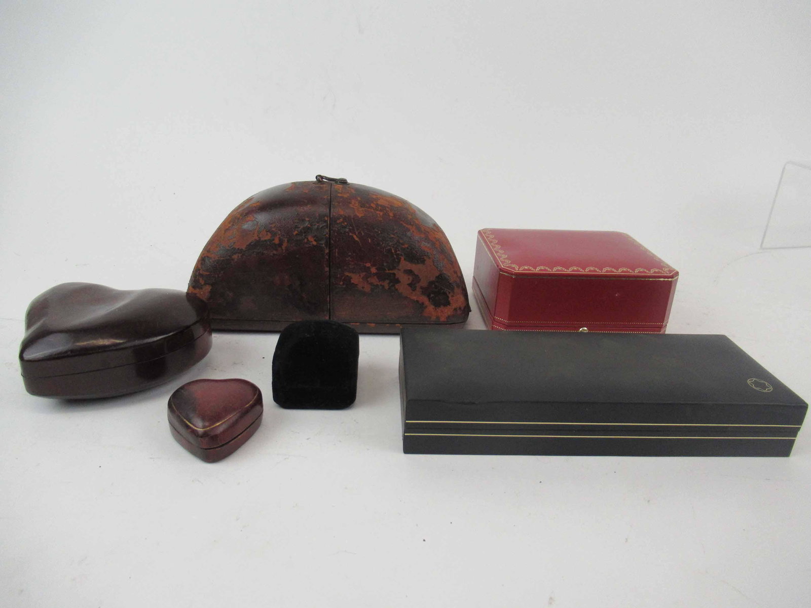 Elsa Peretti Italy Leather Tiffany Heart Box: Elsa Peretti Italy Leather Tiffany Heart Shaped Box. Together with a small heart shape box, Antique Leather Dome box, Cartier watch box, Monte Blanc Pen Box and a Merrin ring box. Used condition, wear