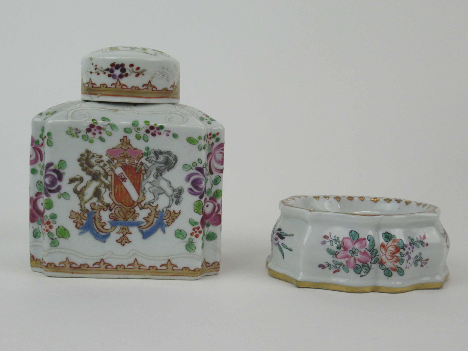 Chinese Export Armorial Famille Rose Salt Cellar: Chinese Export Armorial Famille Rose Salt Cellar. Together with a Chinese Export Armorial Famille Rose Tea Caddy. Used condition, tape residue. Caddy size 4 1/4" tall x 3 3/4" wide x 2 3/4" deep.