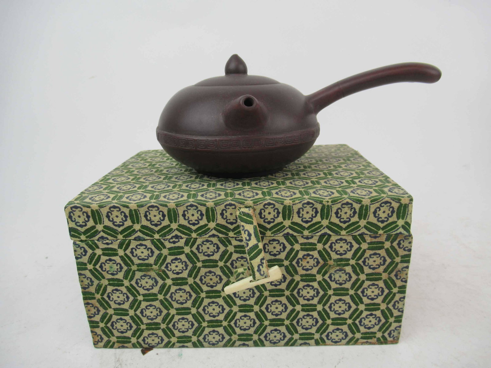 Chinese Yixing Clay Tea Pot With Side Handle: Chinese Yixing Clay Tea Pot With Side Handle and fitted case. 7" long x 3" tall.