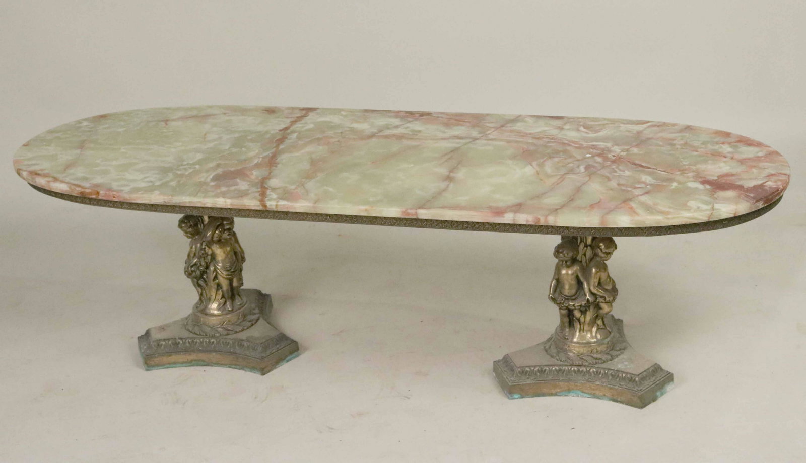 Green Marble Top and Gilt-Metal Low Table: 20th C., with figural two pedestal base. Apx. 17"h x 5'w x 20"d