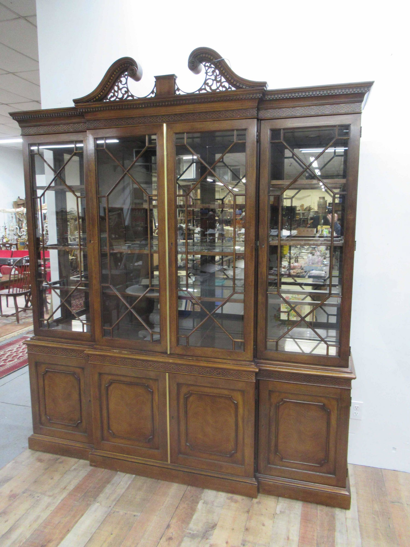 Henredon Mahogany Chippendale Style Breakfront: Henredon Mahogany Chippendale Style Breakfront cabinet in two pieces. Used condition, wear, worn, missing glass and damage to corner. 91" tall x 78" wide.