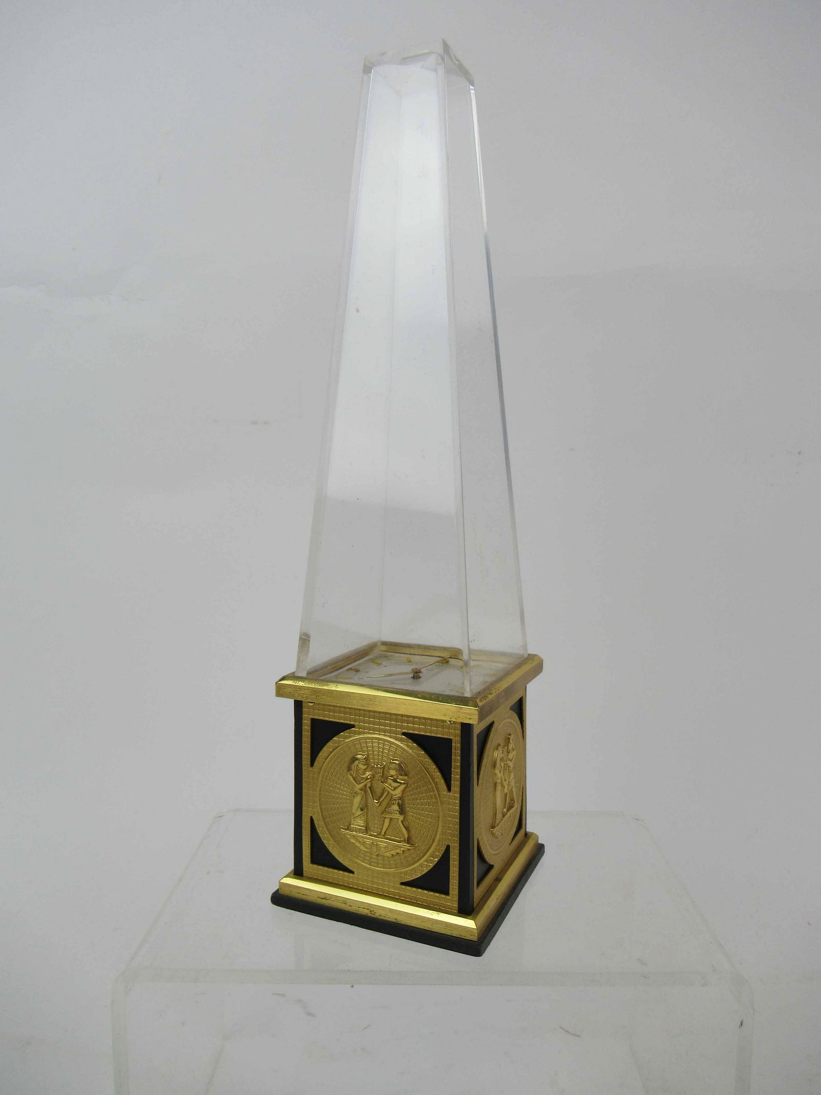 Vintage Le Coultre 8 Day Egyptian Obelisk Clock: Vintage Le Coultre 8 Day Egyptian Obelisk Clock. Used condition, wear, unknown working condition, it does wind. 9 1/2" tall x 2 1/2" x 2 1/2"