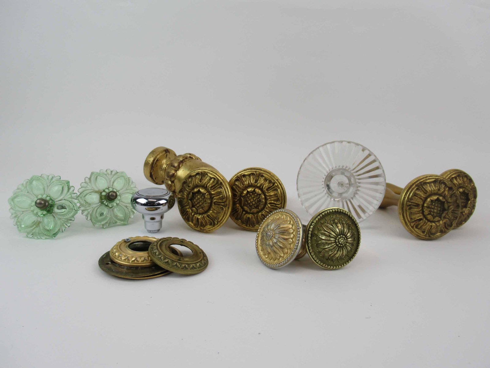 Group of Assorted Curtain Tiebacks: Group of Assorted Curtain Tiebacks. Including depression glass pulls, giltwood and brass door knobs. Used condition.