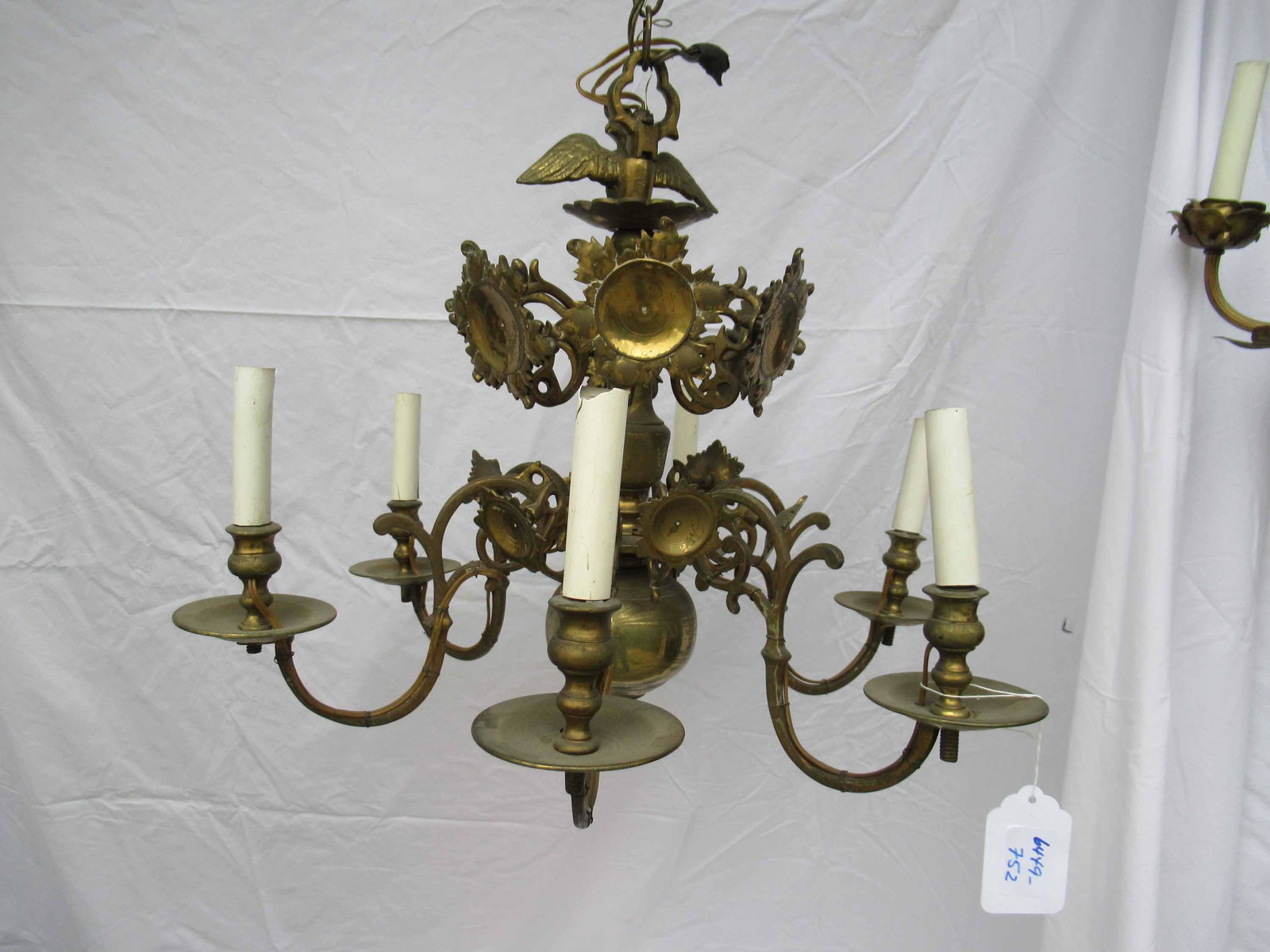 Dutch Baroque Style Brass 6 Light Chandelier: Dutch Baroque Style Brass 6 Light Chandelier having eagle form finial with brass flower form reflectors. Used condition, wear, needs to be rewired. 18" tall x 22" diameter