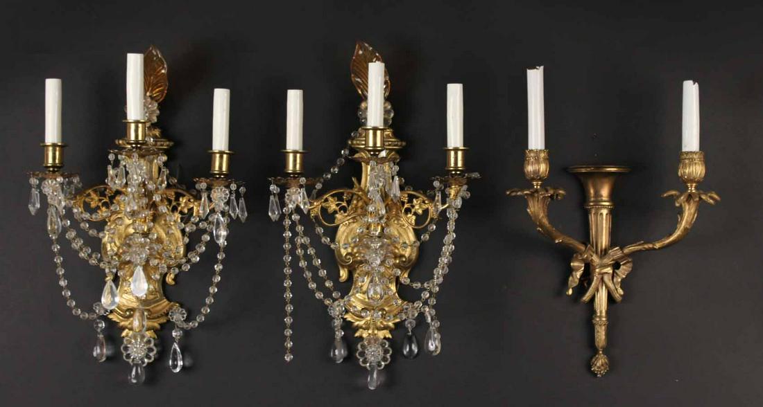 Pair of Neoclassical Glass and Metal Sconces: Together with a single sconce.
