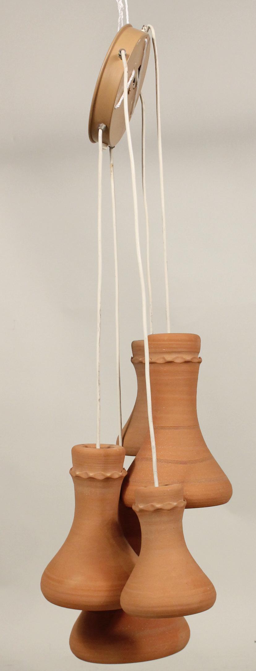 Five Light Terracotta Lighting Fixture: Five Light Terracotta Lighting Fixture. In the Southwest Style.Provenance: The Collection of the Estate of Elayne and Monroe Weinstein, Poughkeepsie, NY.