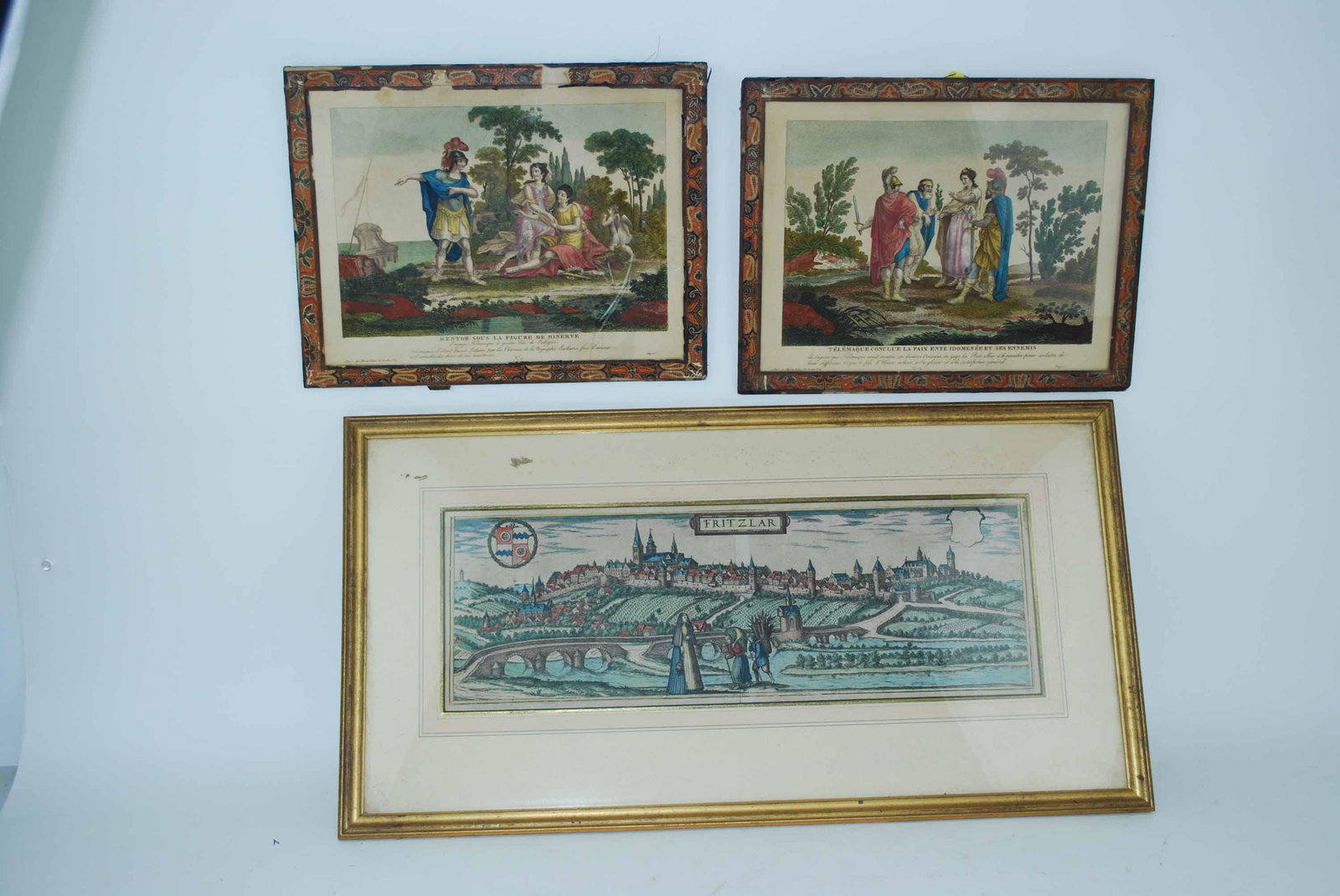 Two Colored Engravings of Roman Scenes: Two Colored Engravings of Roman Scenes, one titled Mentor Sous La Figure De Minerve and the other titled Telemaque Conclue La Paix Ente Idomentee Et Ses Ennemis. Together with a colored engraving titl