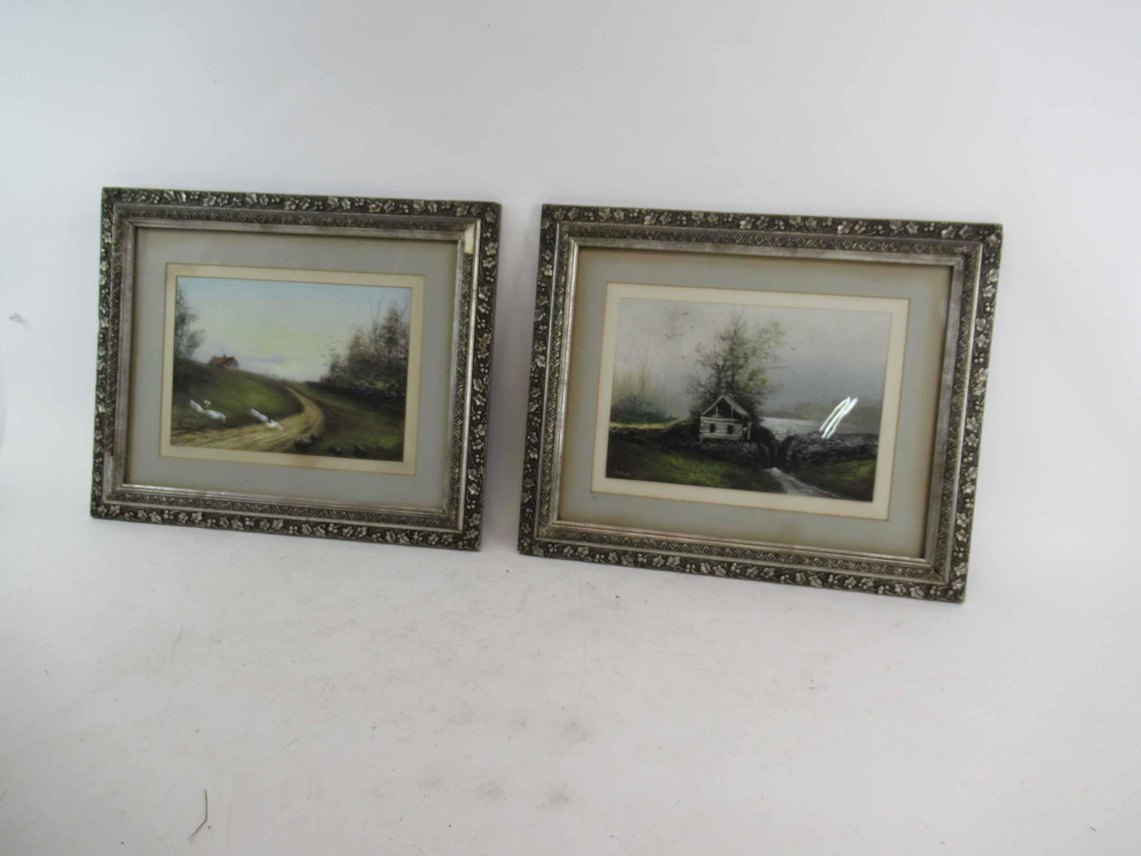 Two Pastel on Paper Landscapes: Two Pastel on Paper Landscapes, one signed Nichols lower left. Each in antique frames. Used condition, wear, worn, mat burn, not examined outside of frame, some missing pieces to each frame. Framed si