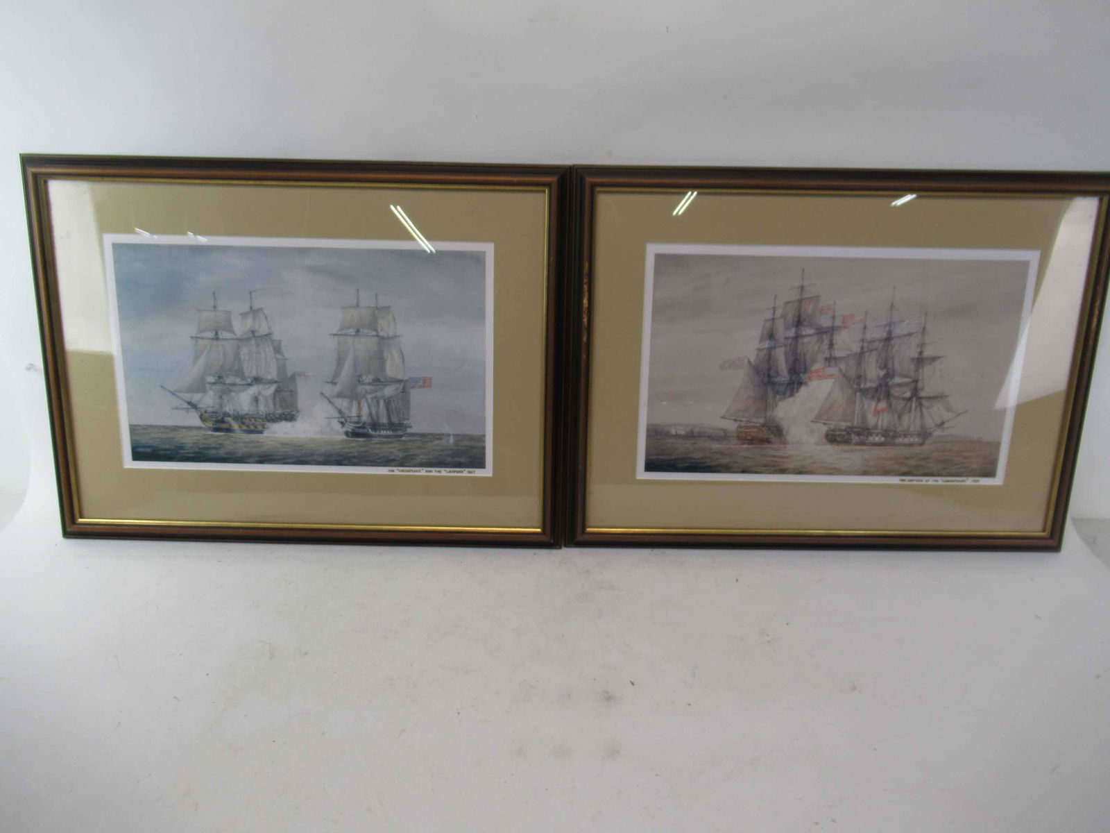 Two Prints of British and American Navel Ships: Two Prints of British and American Navel Ships. The Chesapeake and Leopard 1807, the other The Capture of the Chesapeake 1813. Used condition, framed size 24 1/4" long x 18" long.