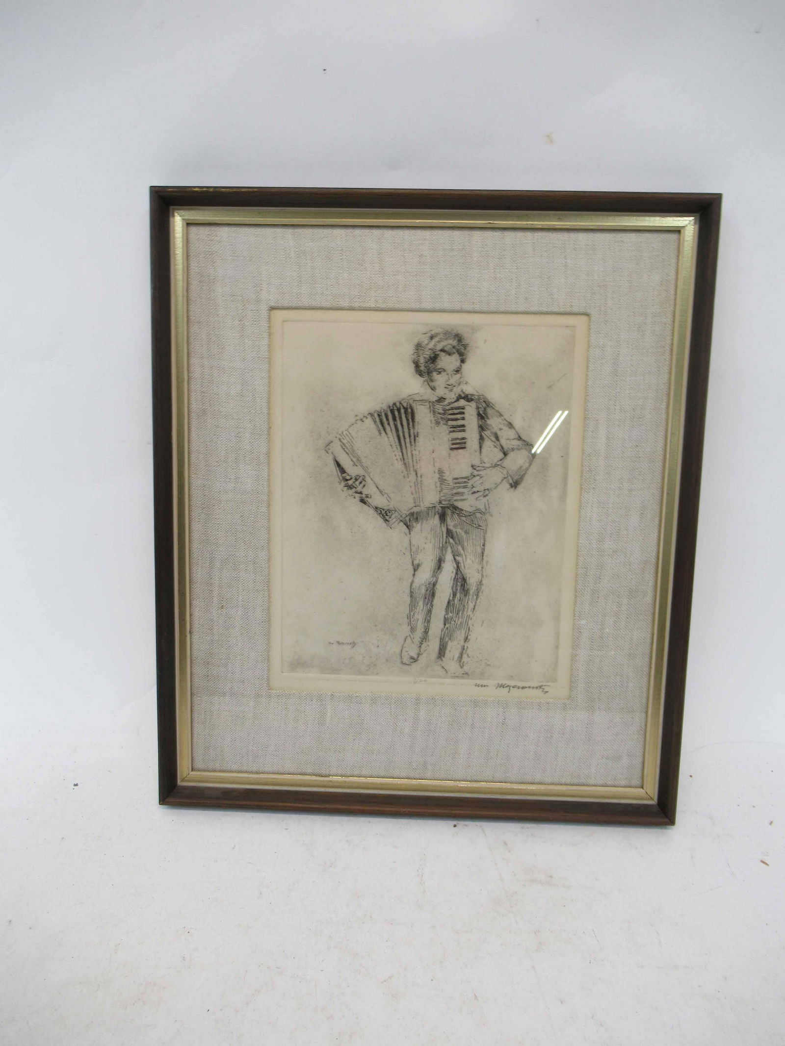 Etching by William Meyerowitz of Accordion Player: Etching by William Meyerowitz. American, 1887-1981. Etching of an accordion player. Used condition. Framed size 17" tall x 14 1/2" wide