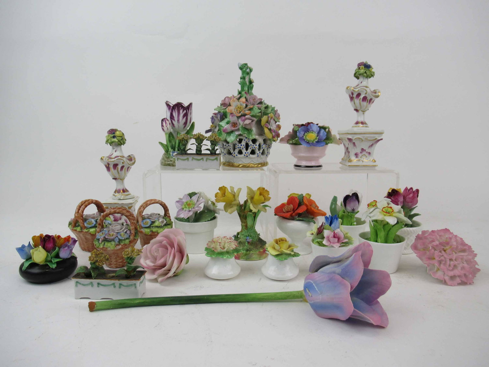 Mottahedeh Porcelain Floral Reticulated Basket: Mottahedeh Porcelain Floral Reticulated Basket 6" tall x 4" diameter. Together with a assortment of porcelain floral baskets and flowers. Including Crown Staffordshire, Denton. Used condition, wear, w