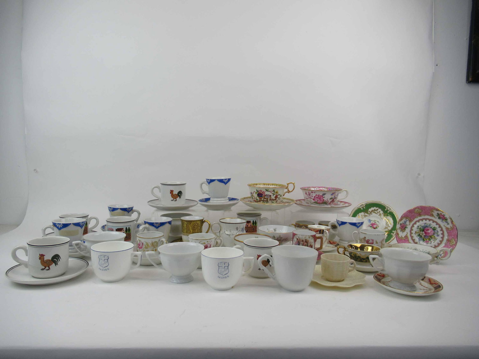 Group of Assorted Cups and Saucers: Group of Assorted Cups and Saucers. Including 5 cups and saucers of Villeroy & Boch design Naif. Used condition, wear, worn, chips cracks.