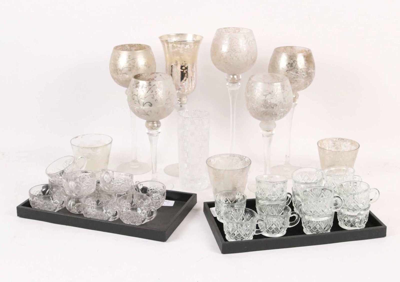 Tiffany & Co Basket Weave Glass vase: Together with nine mercury glass style votive candle holders, twenty five glass punch cups, an art glass bowl and a footed cranberry glass bowl. Size: Tallest 16"h