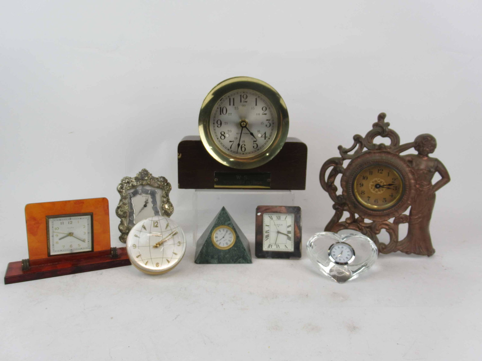 Group of Assorted Table Clocks: Group of Assorted Table Clocks. Including an Art Nouveau Style clock, Swiss Imhof Globe Clock, Leeman quartz pyramid, Mikasa glass Clock, Links London Silver plated Desktop clock, Florn 7 jewels Germa