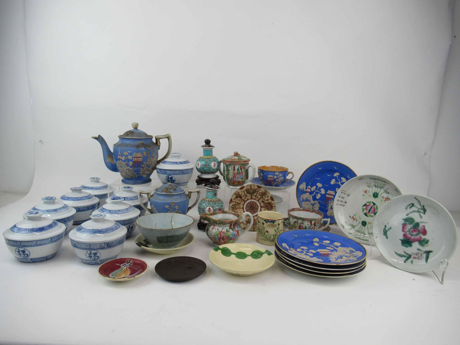 Group of Assorted Asian Table Articles: Group of Assorted Asian Table Articles. Including Japanese enamel decorated tea set, 8 William Sonoma soup bowls, Famille Rose cream and sugar, cup and saucer. Used condition, wear, worn, chips, crack