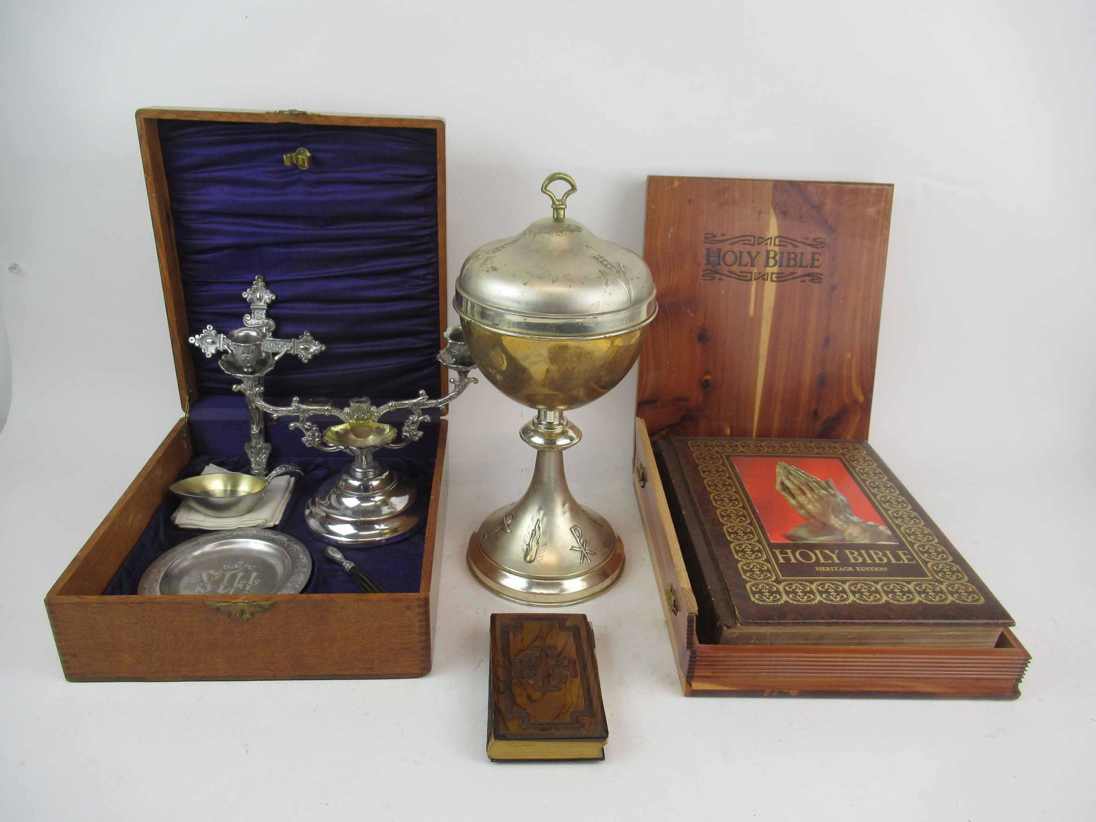 Group of Assorted Religious Articles: Group of Assorted Religious Articles. Including Altar Chalice, pocket book of common prayer church of England, Holy Bible Heritage Edition, Altar or Sick call set in fitted case. Used condition, wear,