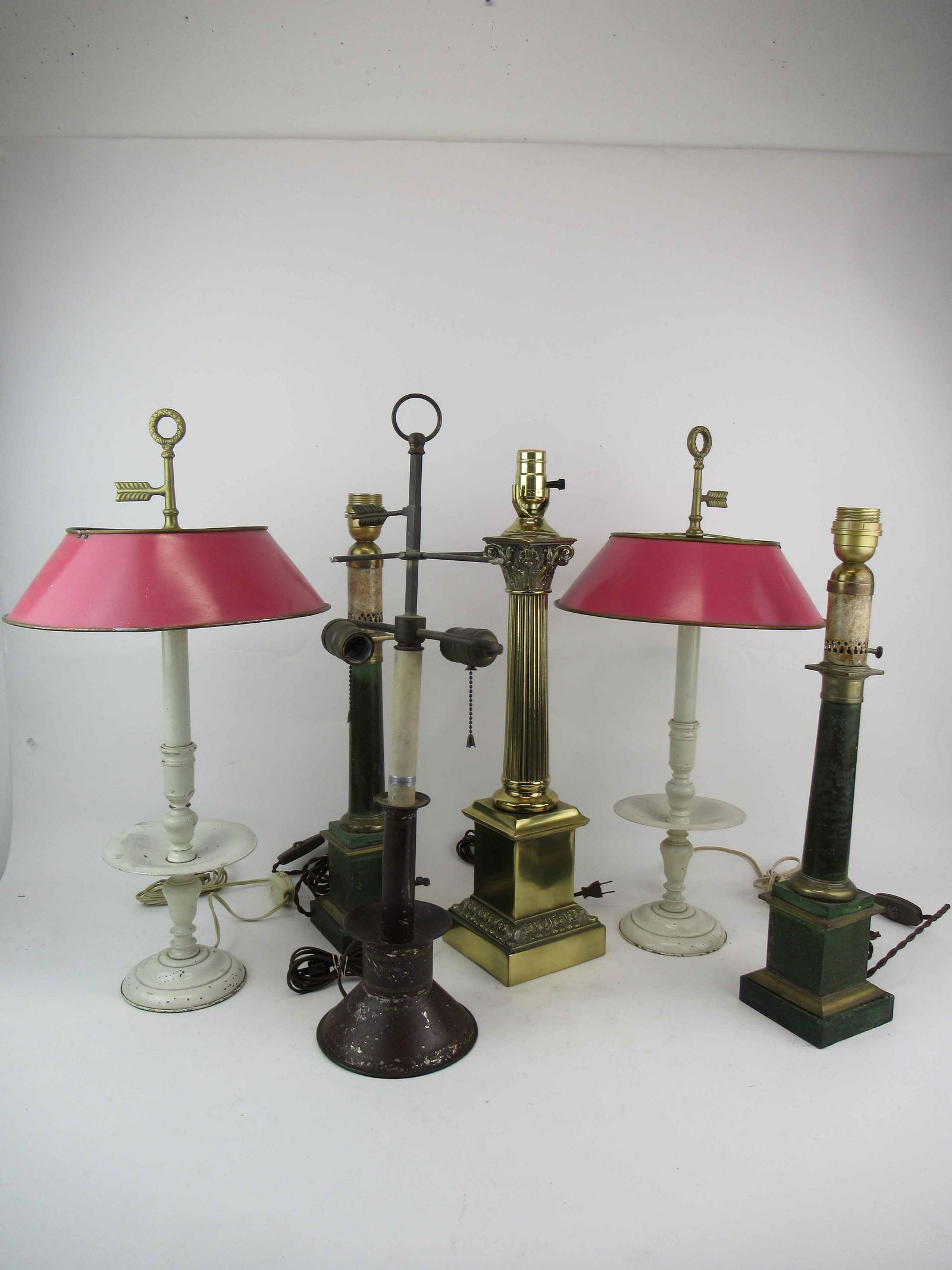 Group of Assorted Table Lamps: Group of Assorted Table Lamps. Including a Pair of white painted with pink toleware shades, pair of green column form, brass column form and a antique red toleware table lamp. Used condition, wear, wo