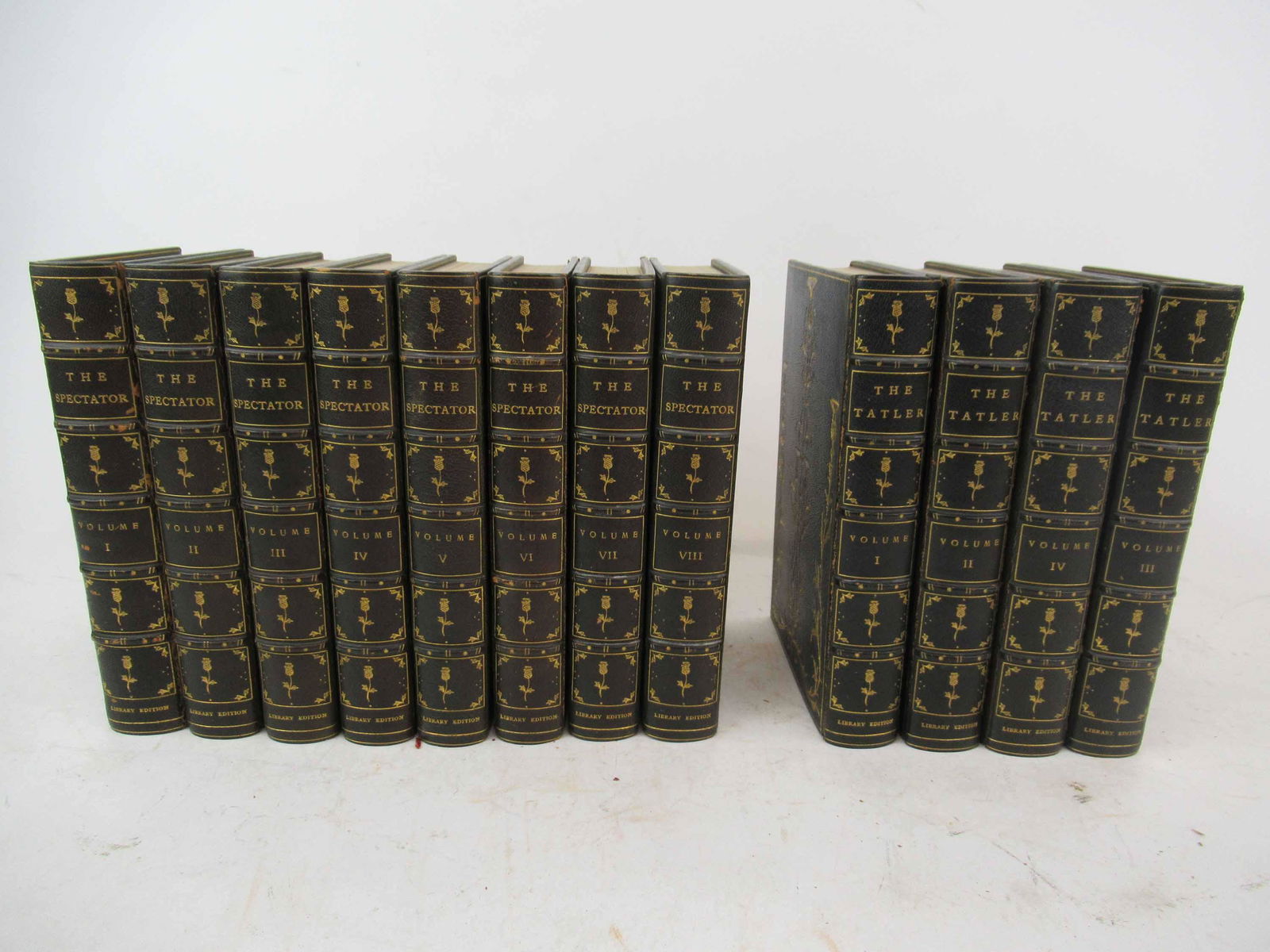 12 Leather Vol The Tatler and The Spectator: 12 Leather Vol The Tatler and The Spectator Books Copy Number 3. The Library Edition, 1897-1898. J.B. Millet Company, George Aitken introduction. Blue leather with gilt floral decoration. Used conditi