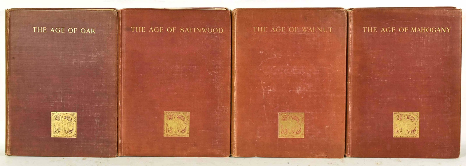 Four Volumes "A History of English Furniture": By Percy Macquoid, R.I., London: Lawrence & Bullen, Ltd. New York: G.P. Putnam's Sons, 1908, titled "Age of Satinwood," "Age of Oak," "Age of Walnut," and "Age of Mahogany." All books sold "as is." No