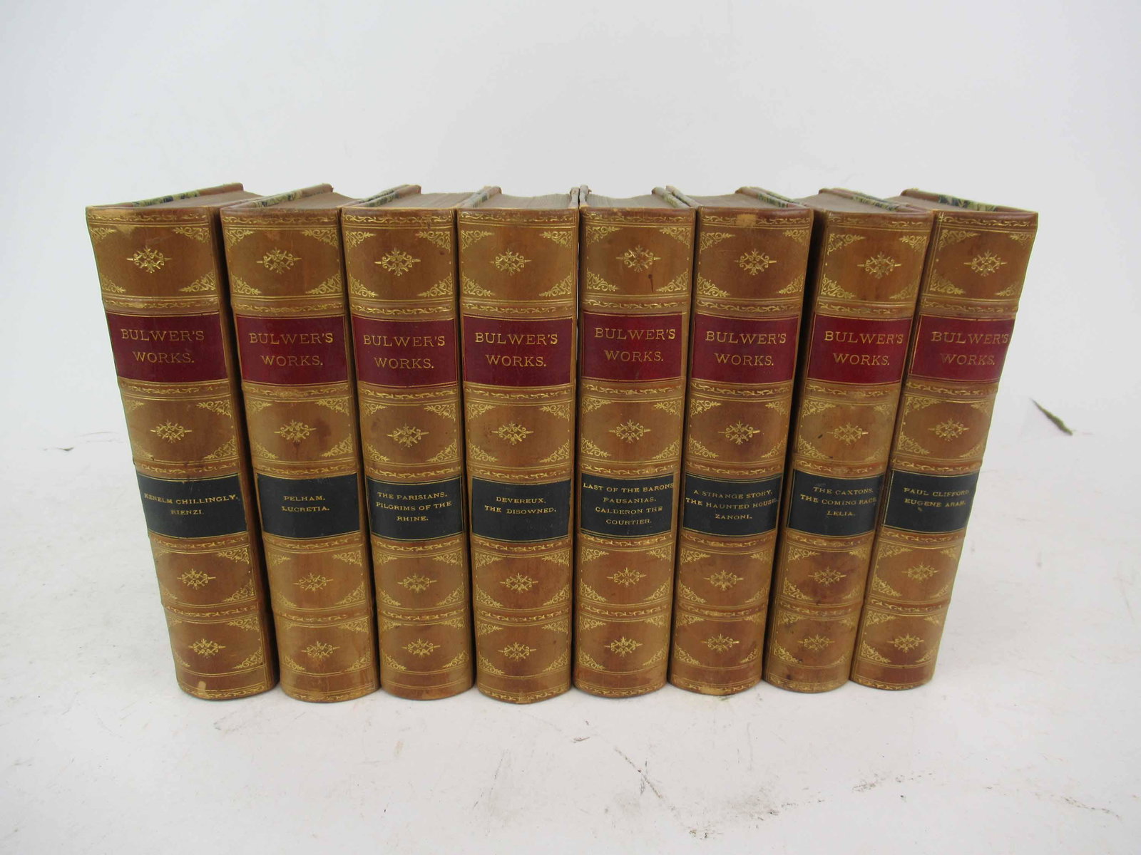 8 Vol. Bulwer's Works: 8 Vol. Bulwer's Works, Sir Edward Bulwer Lytton, Bart. Having leather and marblized bindings. Used condition, wear, worn, fading. 7 1/2" x 5"