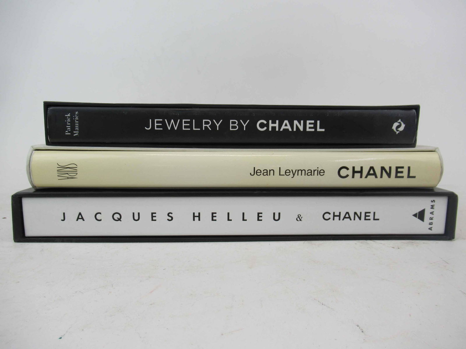 Group of Assorted Chanel Books: Group of Assorted Coco Chanel Books. Including Jewelry by Chanel - Patrick Mauries, Chanel by Jean Lymarie and Jacques Helleu and Chanel. Used condition, wear, worn.