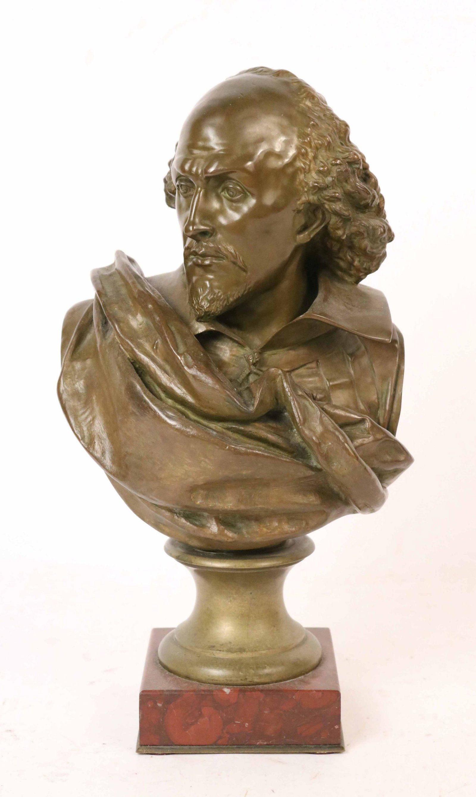 A.Carrier-Beleuse, Cast Bronze of Shakespeare: Cast bronze bust of Shakespeare, Albert Ernest Carrier-Belleuse (French, 1824-1887) signed A Carrier Belluse. Also bears mark "Bronze Garanti au Titre" and another mark on red marble base. 14"h x 7"w