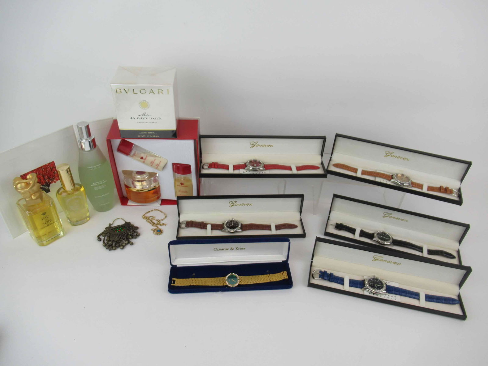 Group of 5 Genevex Ladies Quartz Watches: Group of 5 Genevex Ladies Quartz Watches in assorted colors. Together with Camrose and Cross watch, brooch, Clarins Paris Eau De perfume 1.7 fl, Bvlgari Mon Jasmine Noir Eau De perfume1.7 fl. , Eau Du