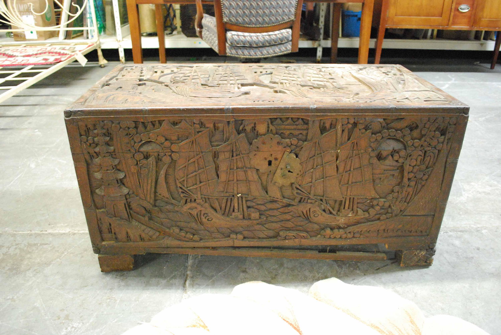 Vintage Chinese Hardwood Carved Blanket Chest: Vintage Chinese Hardwood Carved Blanket Chest depicting sailing ships and pagodas. Used condition, wear ,worn, cracks , chips, splits, surface distress, may be in need of repair. 38 1/2" long x 18 1/2
