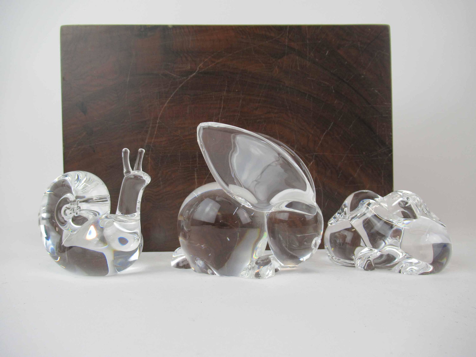 Group of Assorted Steuben Crystal Paperweight: Group of Assorted Steuben Crystal Paperweight figurines. Including snuggling puppies, snail and rabbit. Used condition, minor scratches. Bunny size 3 3/8" tall x 3 3/4" long