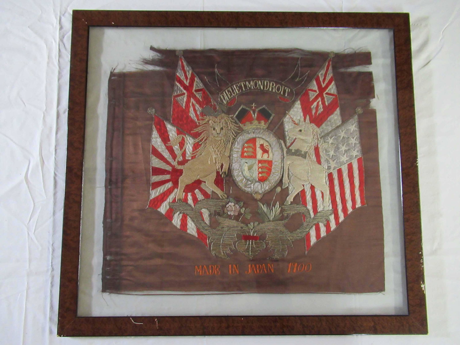 Antique Eight Nation Alliance Flag From 1900: Antique Eight Nation Alliance Commemorative Needlework and beaded Flag from 1900 with Japanese, Great Britain and United States Navy Flags and central United Kingdom coat of arms. Used condition, wear