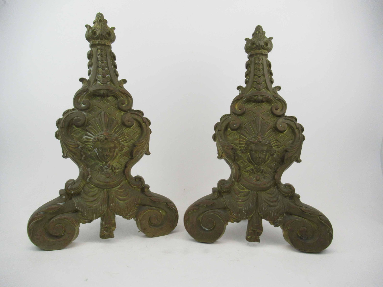 Pair of Bronze Continental Andirons: Pair of Bronze Continental Andirons. Used condition, wear, worn. 21 1/4" tall x 13 3/4" wide