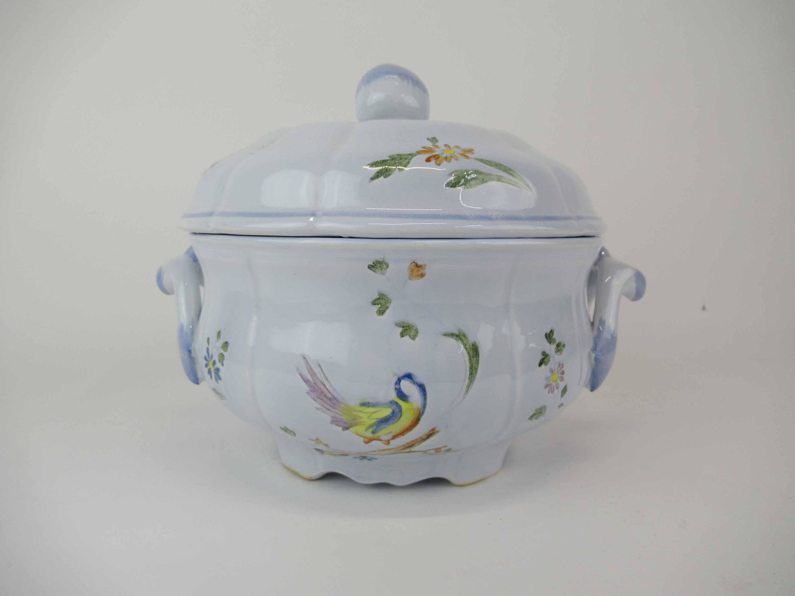 Longchamp Perouges French Faience Soup Tureen: Longchamp Perouges French Faience Soup Tureen with bird pattern and apple finial, used condition, wear/worn; measures 9 1/4" high x 11 3/4" long x 9 1/4" in diameter