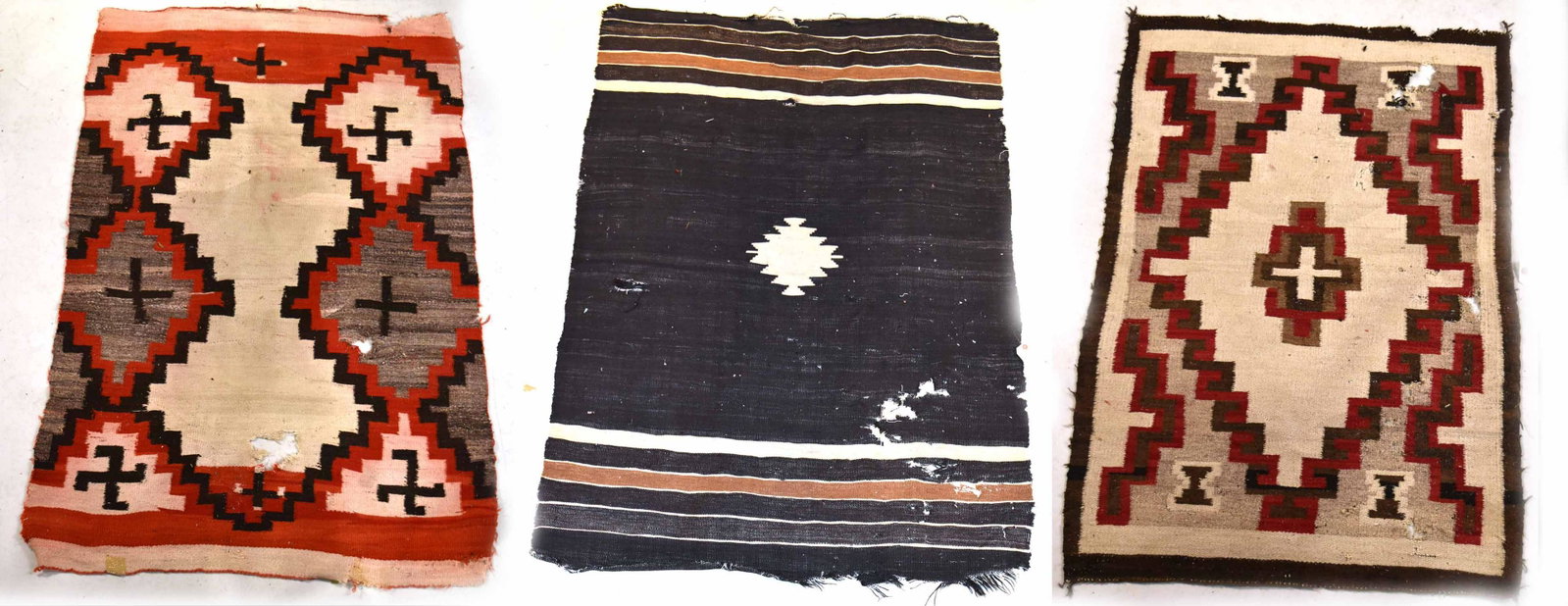 Three Navajo Wool Rugs: American, early 20th C. comprising, a storm pattern rug, a sampler pattern, and a chindi rug. All have wear and losses. From; 4'3"l x 34"w to 5'9"l x 4'2"w