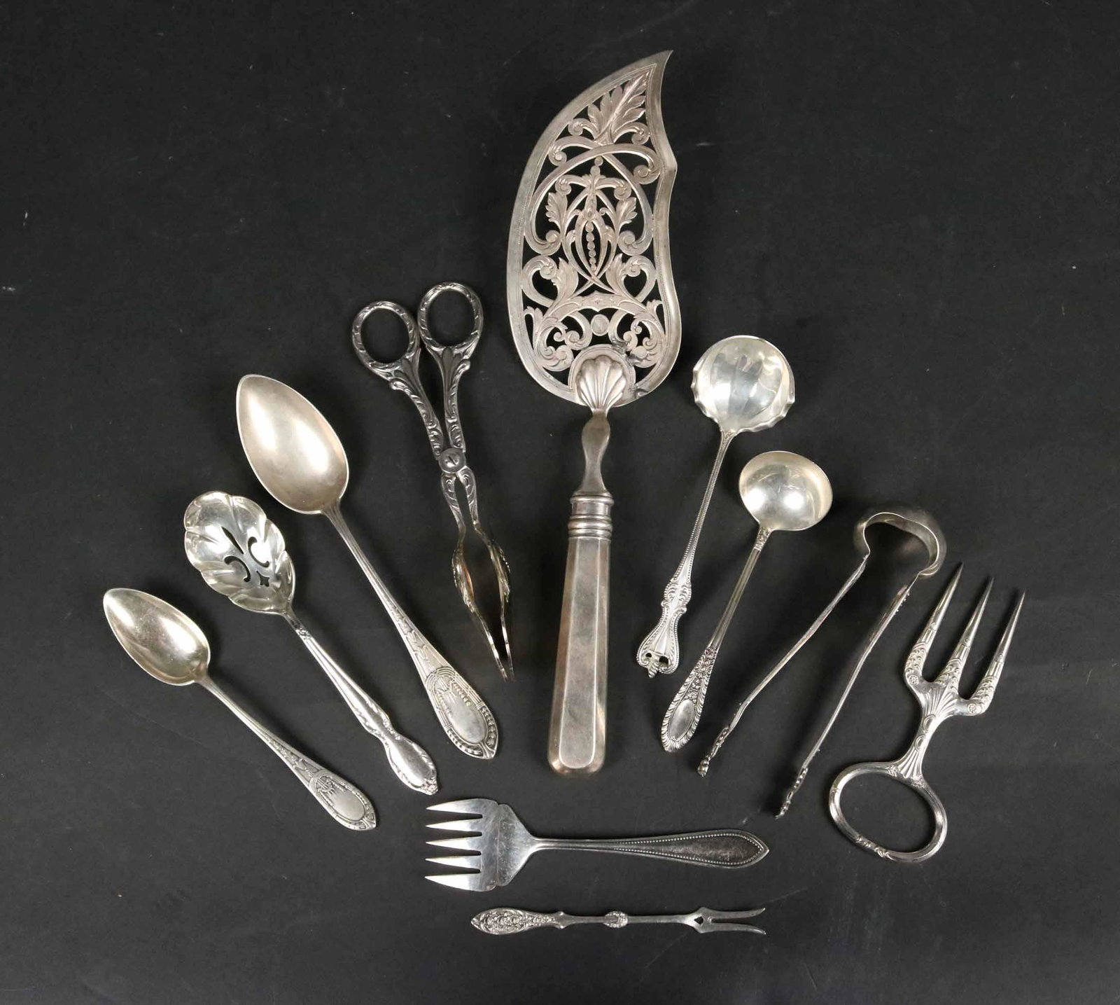 Russian 84 Silver Fish Server: Together with an Old Colonial sterling ladle, sterling ladle and a sterling condiment fork. Apx. 6 t.o. Together with silver plated flatware pieces.