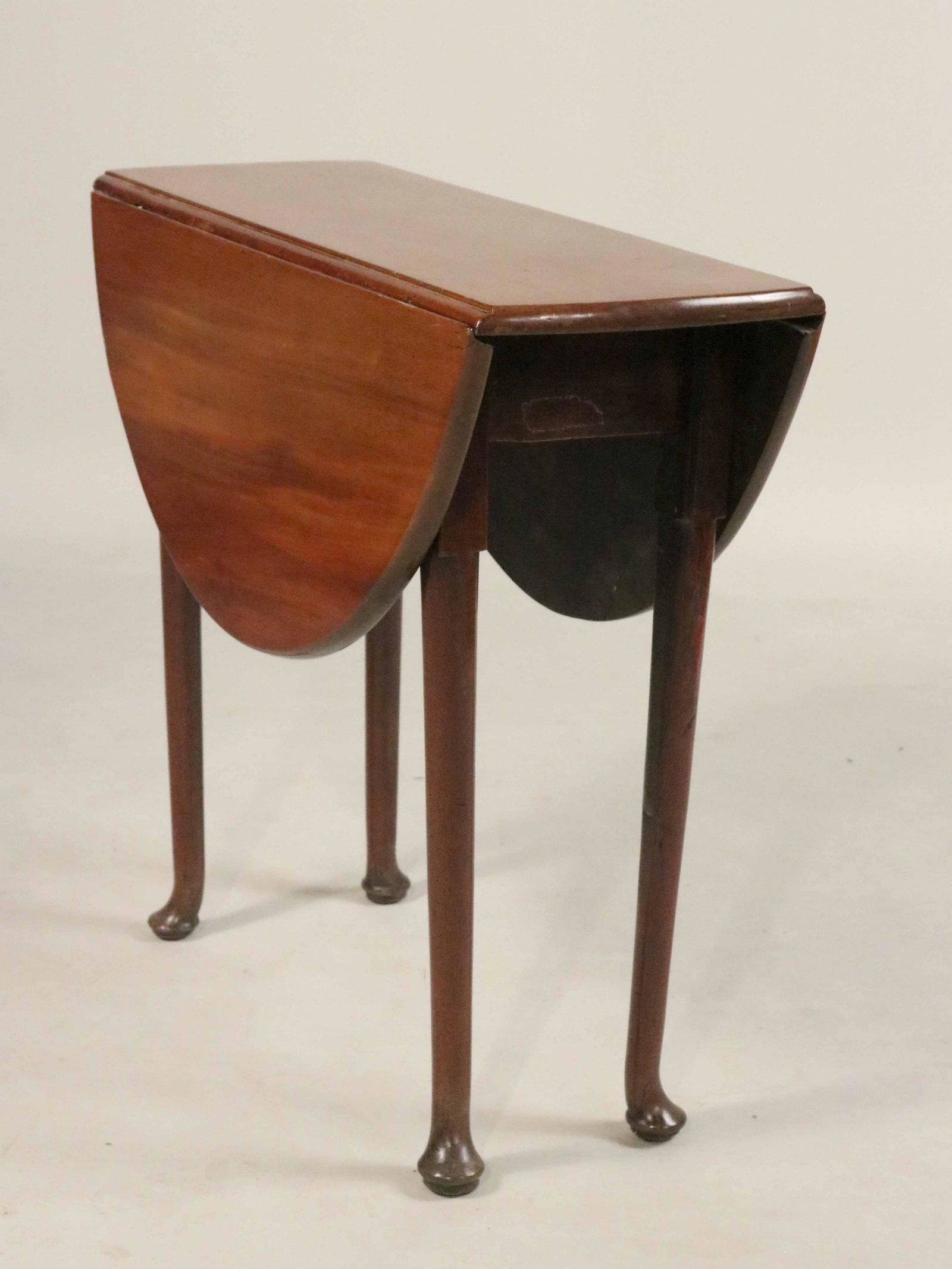 George II Mahogany Diminutive Drop-Leaf Table: English, 18th C. Repairs. Closed: 27-1/2"h x 11-1/2"w x 29-3/4"d Open: 27-1/2"h x 35-1/4"w x 29-3/4"d