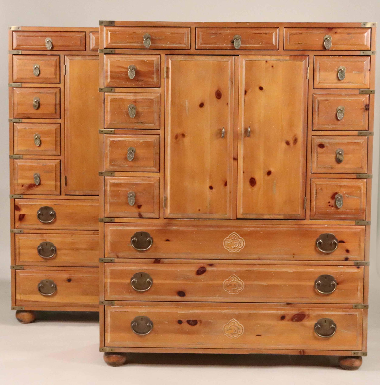 Two Henredon Japanese Style Pine Tansu Cabinets: 20th C. The drawer stamped Henredon and the backs also marked, one backboard cut for T.V. wires. 5'2"h x 48"w x 18"d