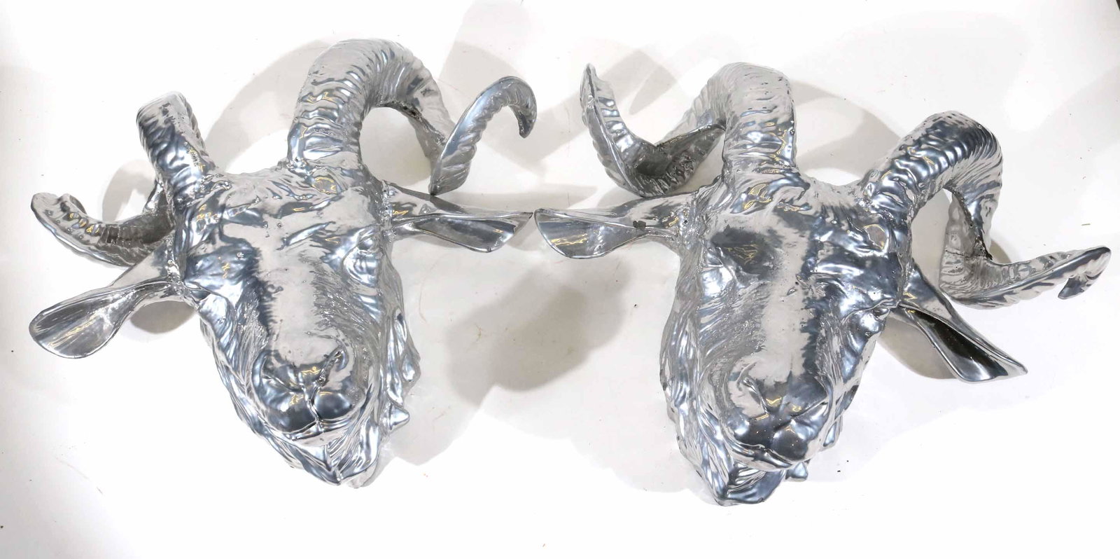 Pair of Cast Metal Ram's Head Wall Plaques: 20th C. 16"h x 19"w x 7-1/2"d