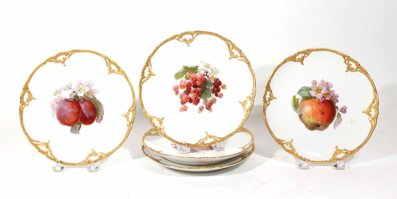 Five KPM Gilt-Embossed Porcelain Fruit Plates: German, marked with KPM scepter and crown. 7-1/2"dia.