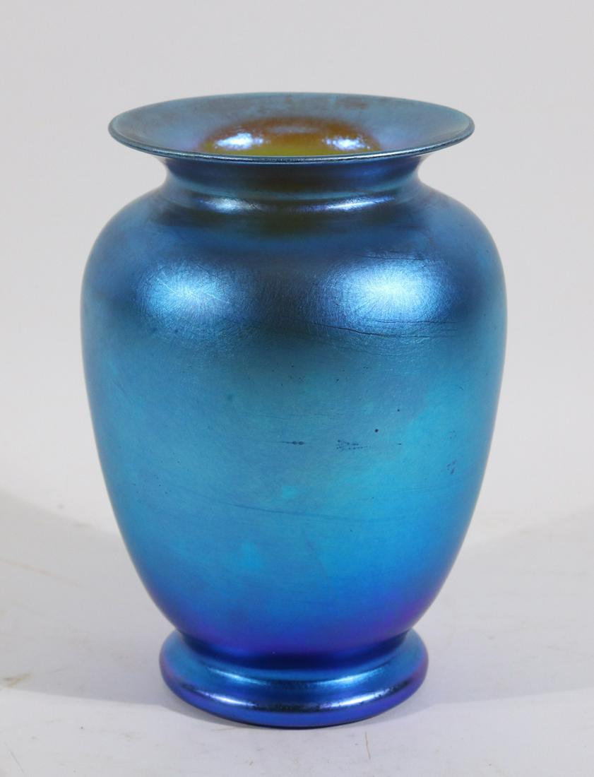 Blue Favrile Iridescent Vase: Probably L.C. Tiffany, unsigned. 6-3/4"h x 5"dia. Provenance: Gift to Consignor's Grandparents from the DuPont family