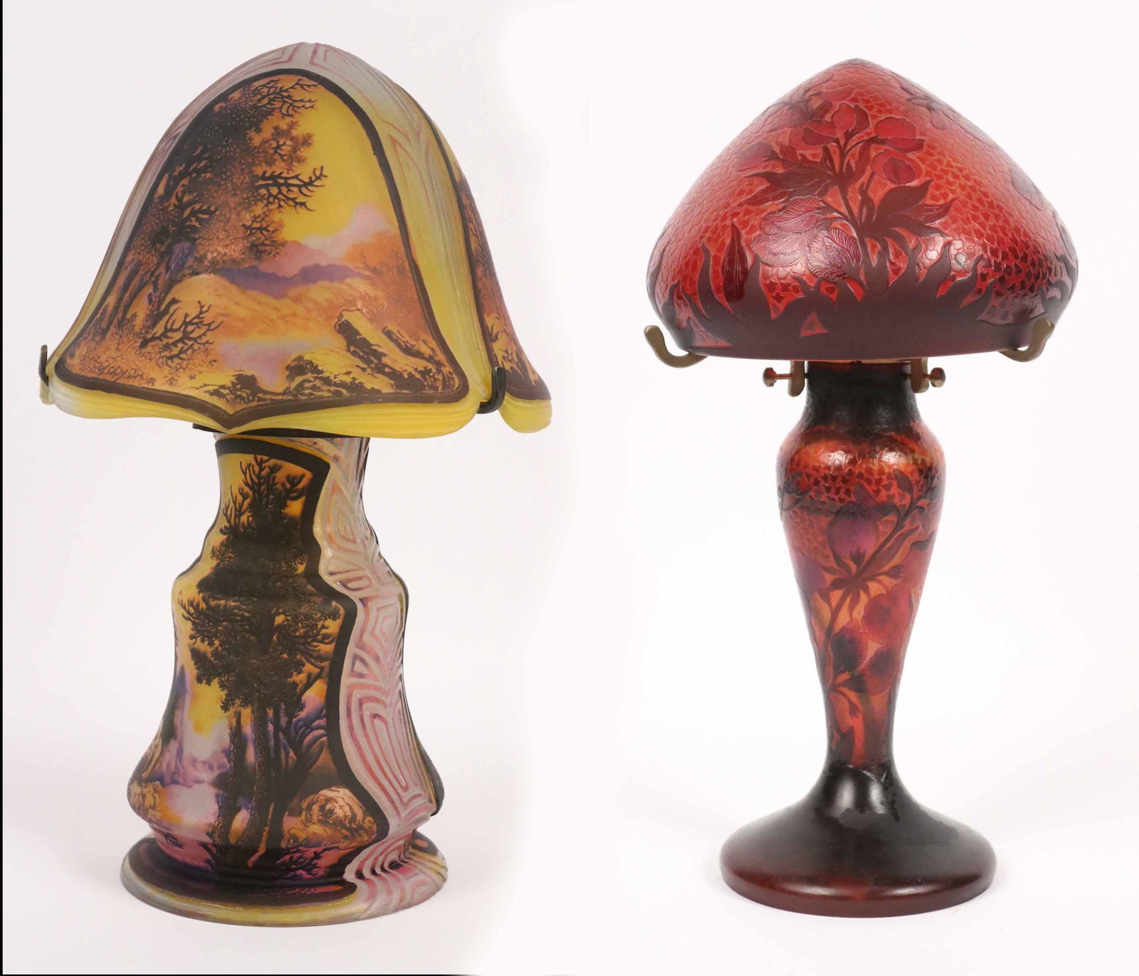 Art Nouveau Style Galle Cameo Glass Table Lamp: Shade signed Galle. Together with an Art Nouveau style cameo glass table lamp, signed "Husant Noble(?)." One lamp bent. 14"h and 15"h