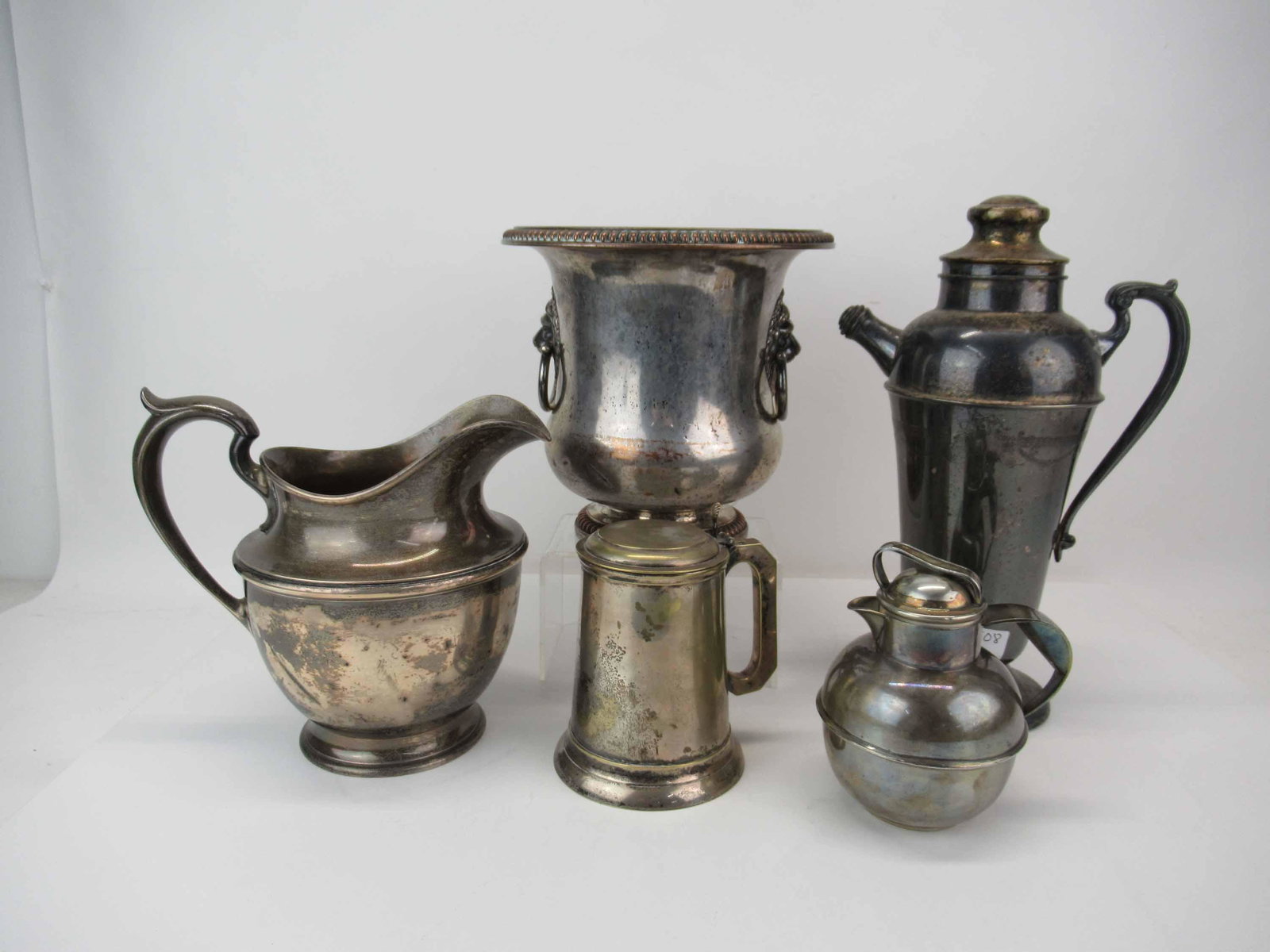 Gorham Sterling Silver Water Pitcher: Together with a silver plated wine cooler, tea pot, thermos, and a tankard. Apx. 21 t.o.