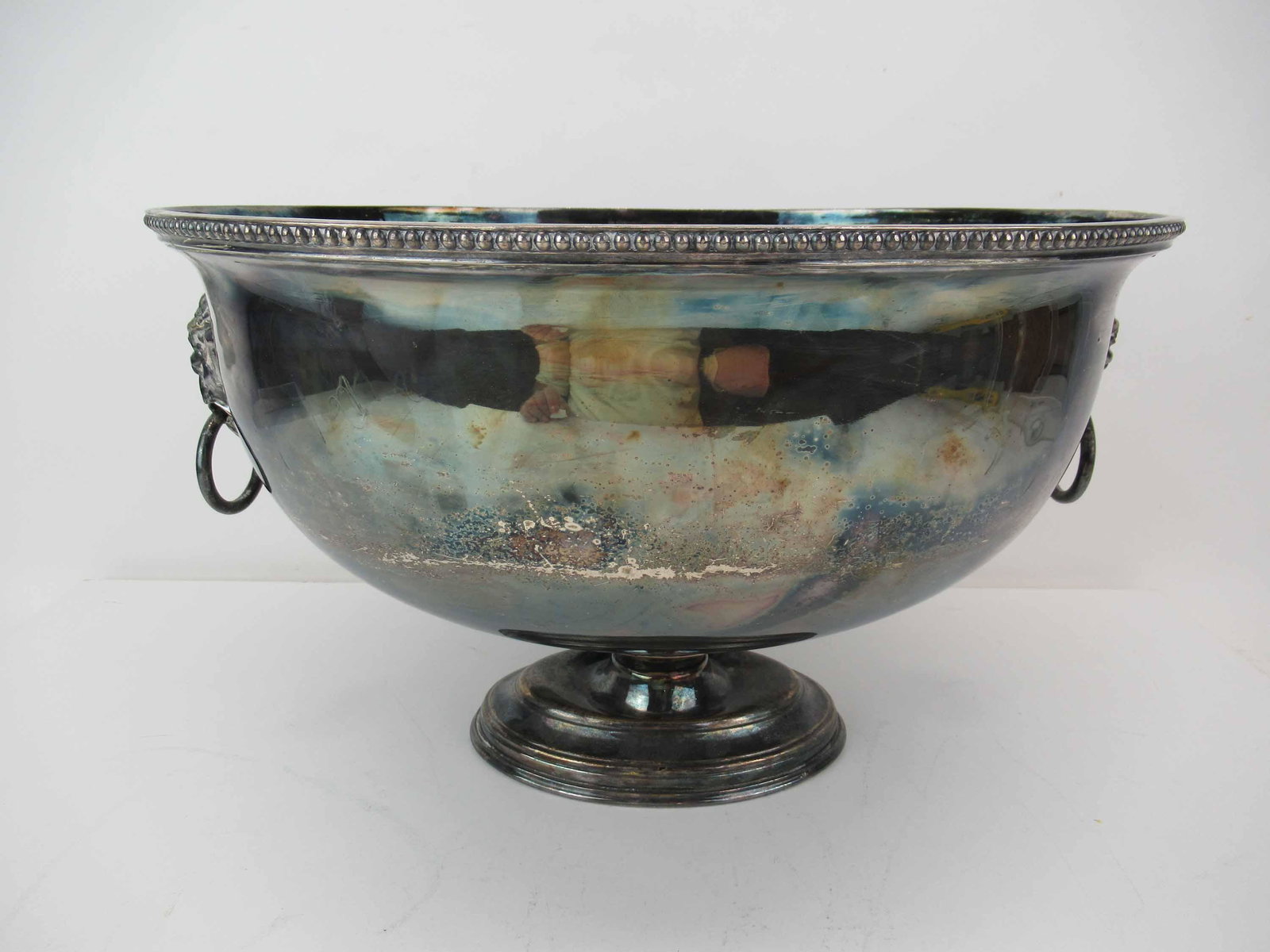 Large Silver Plated Lion Ringed Wine Cooler: Large Silver Plated Lion Ringed Wine Cooler. Used condition wear, worn, scratches, dents, dent to base. 10"h x 16"w.