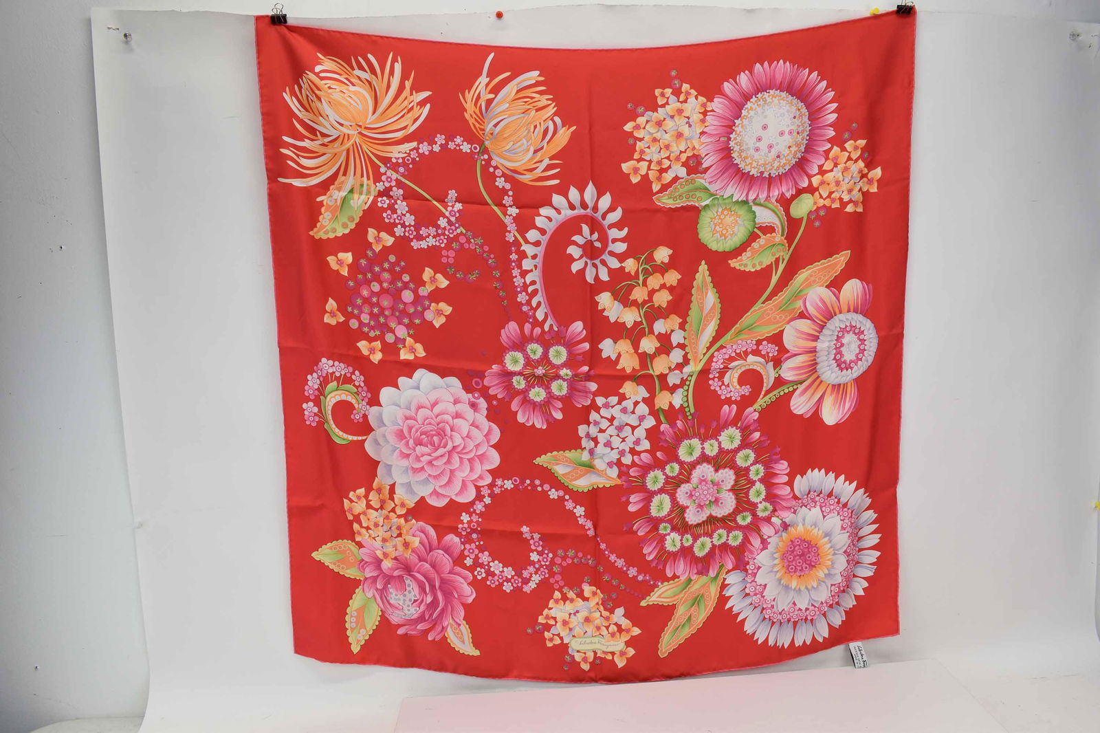 Salvatore Ferragamo Floral Silk Scarf: Salvatore Ferragamo Silk Scarf with original box, Made in Italy, having floral design in pinks and purples; used condition, wear/worn, measures 33"x33"