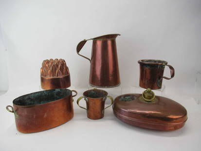 Group of Assorted Antique Copper Table Articles: Group of Assorted Antique Copper Table Articles comprising of a food mold, hot water bed warmer, loving cup with brass handles and a dovetail sides, large tankard with dovetail edge, 1 GAL measure, an