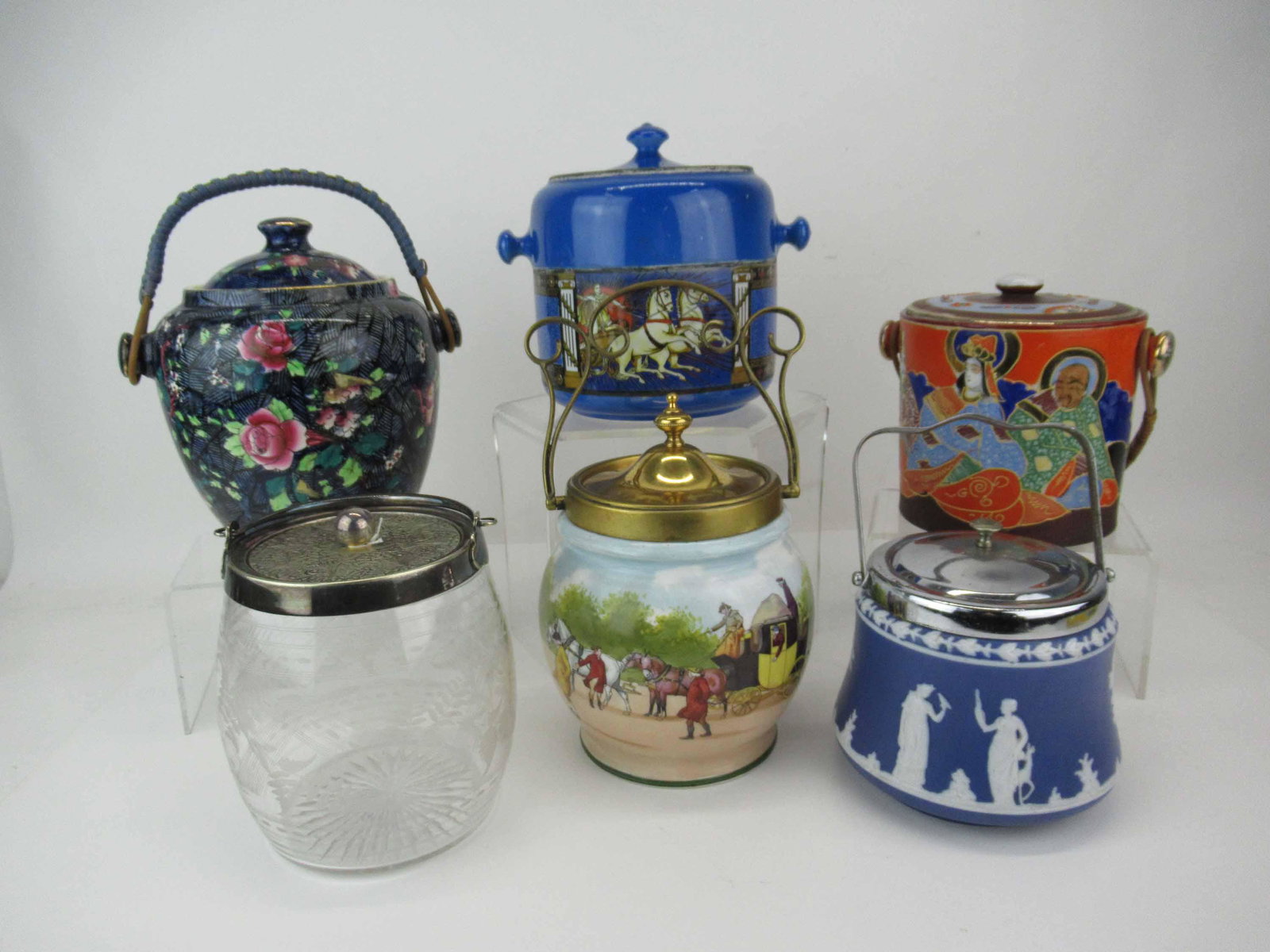 Royal Doulton Coaching Days Biscuit Barrel: Royal Doulton Coaching Days Biscuit Barrel, pattern E2768 with lid stamped W B & Co S together with a Crescent & Sons England blue neoclassical biscuit barrel, Japanese Satsuma style biscuit barrel, E