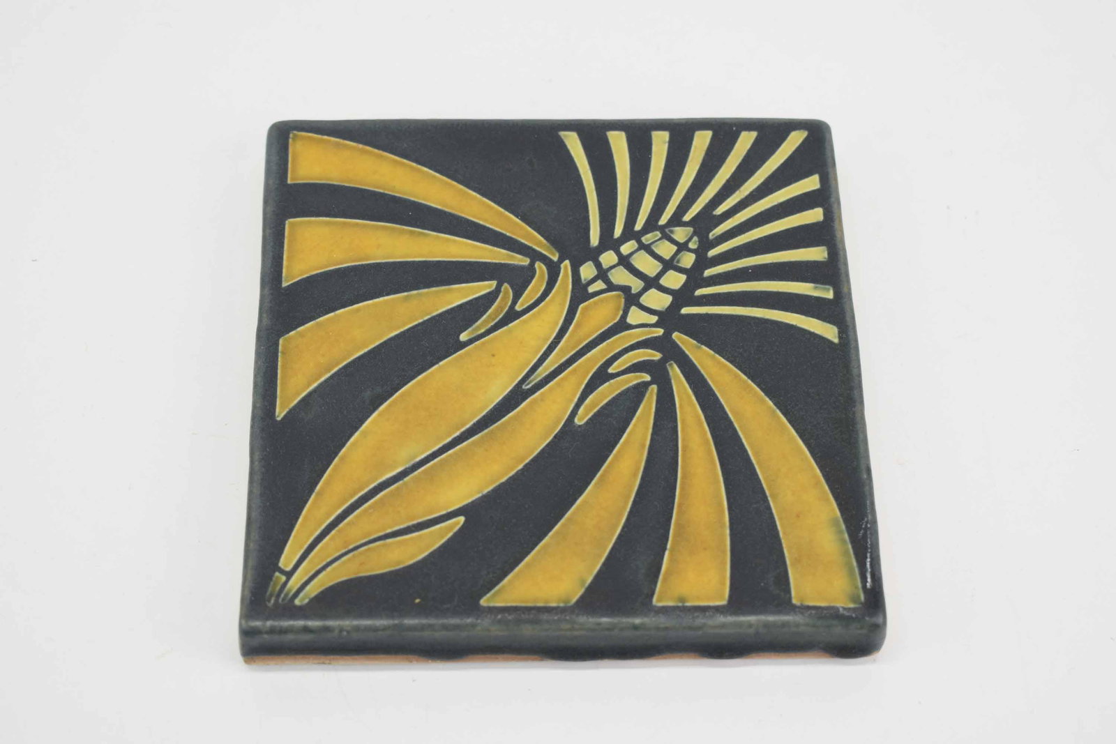 Motawi Tileworks Ceramic Tile: Motawi Tileworks Ceramic Tile, Arts & Crafts style depicting an ear of corn; used condition, wear/worn, measures 5 ¾” x 5 ¾”