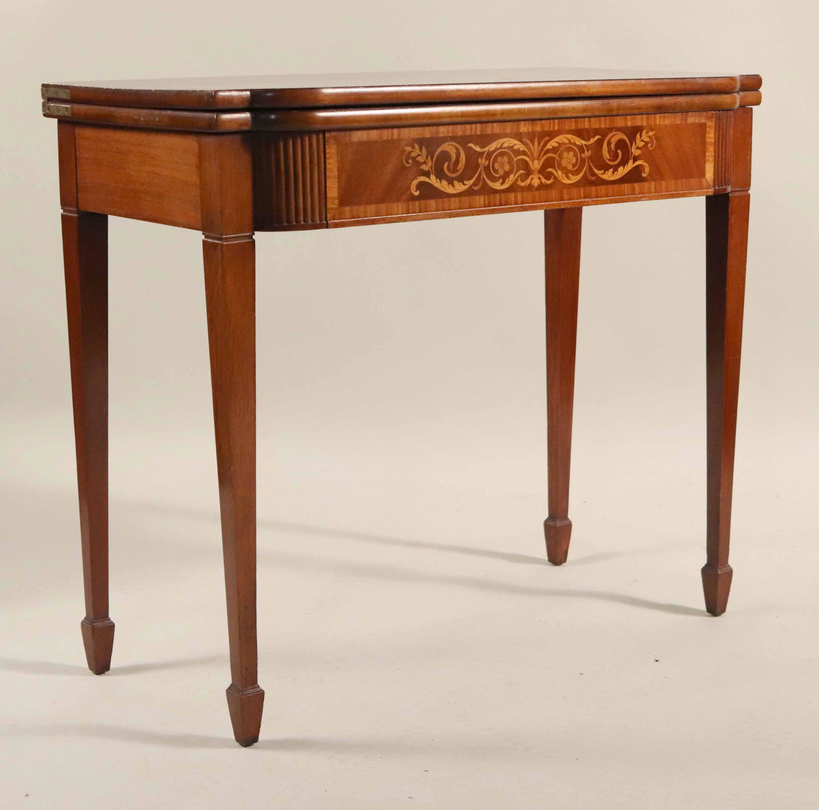 Federal Style Mahogany Swivel-Top Games Table: Wear, distress. 30"h x 34"w x 17"d Provenance: Property from the Estate of Dr. Samy Iosub
