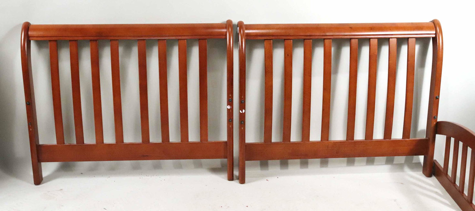 Pair of Contemporary Mahogany Twin Headboards: 31"h x 38-3/4"w Provenance: Property from the Estate of Dr. Samy Iosub