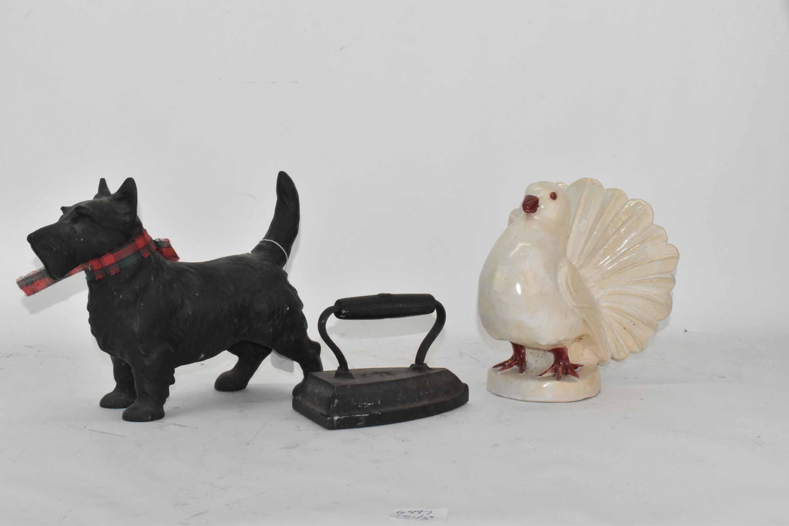 Cast Iron Scottie Dog: Together with a cast iron iron and a ceramic turkey. Losses to the turkey. 11"l