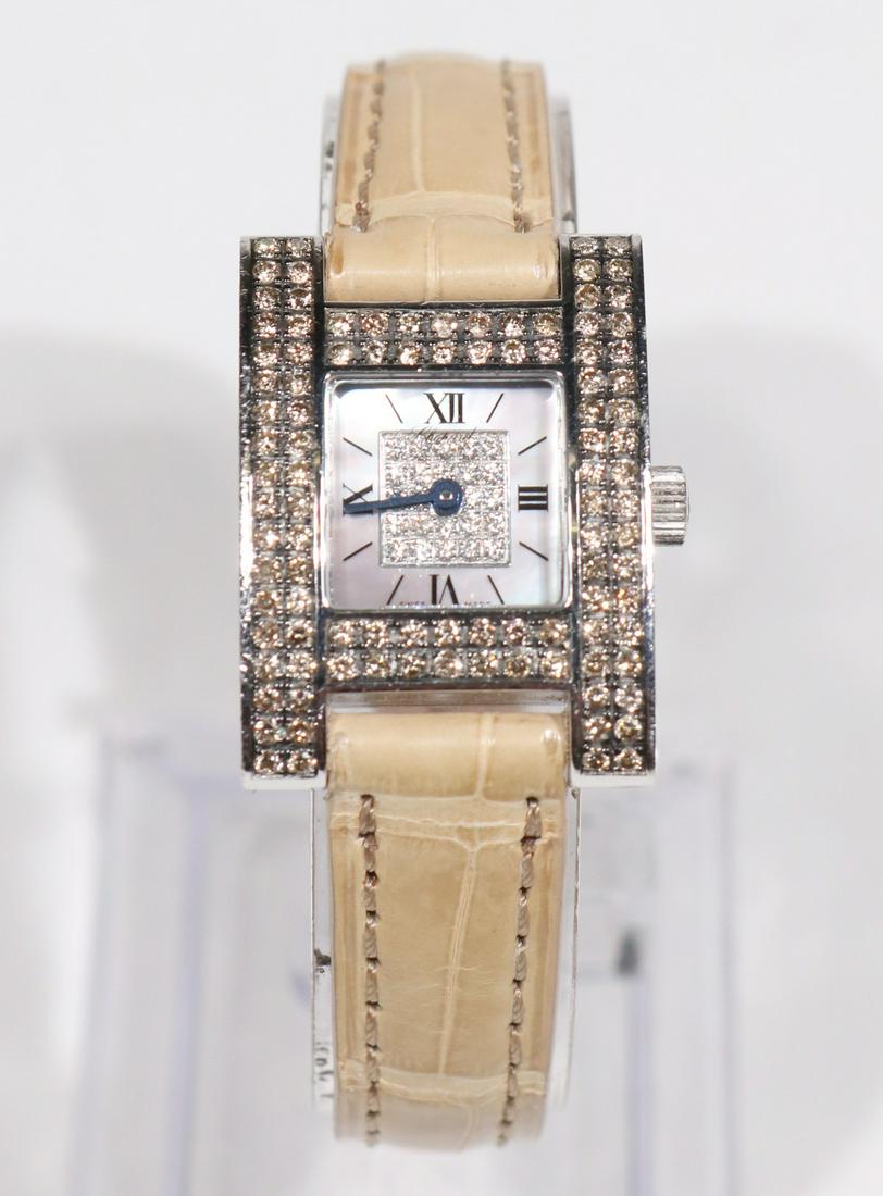 Chopard Ladies Diamond Quartz Wristwatch: A LADIES DIAMOND QUARTZ WRISTWATCH, BY CHOPARD 18k white gold on alligator band with white gold clasp METAL: 18 Karat white gold STONES: white diamonds on dial weighing approx 0.12 carats total weight